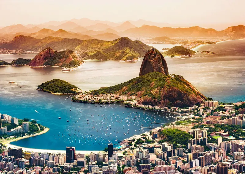Sugarloaf Mountain rising above Botafogo Bay and the Rio skyline