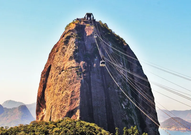 A cable car climbing the sheer granite face of Sugarloaf Mountain